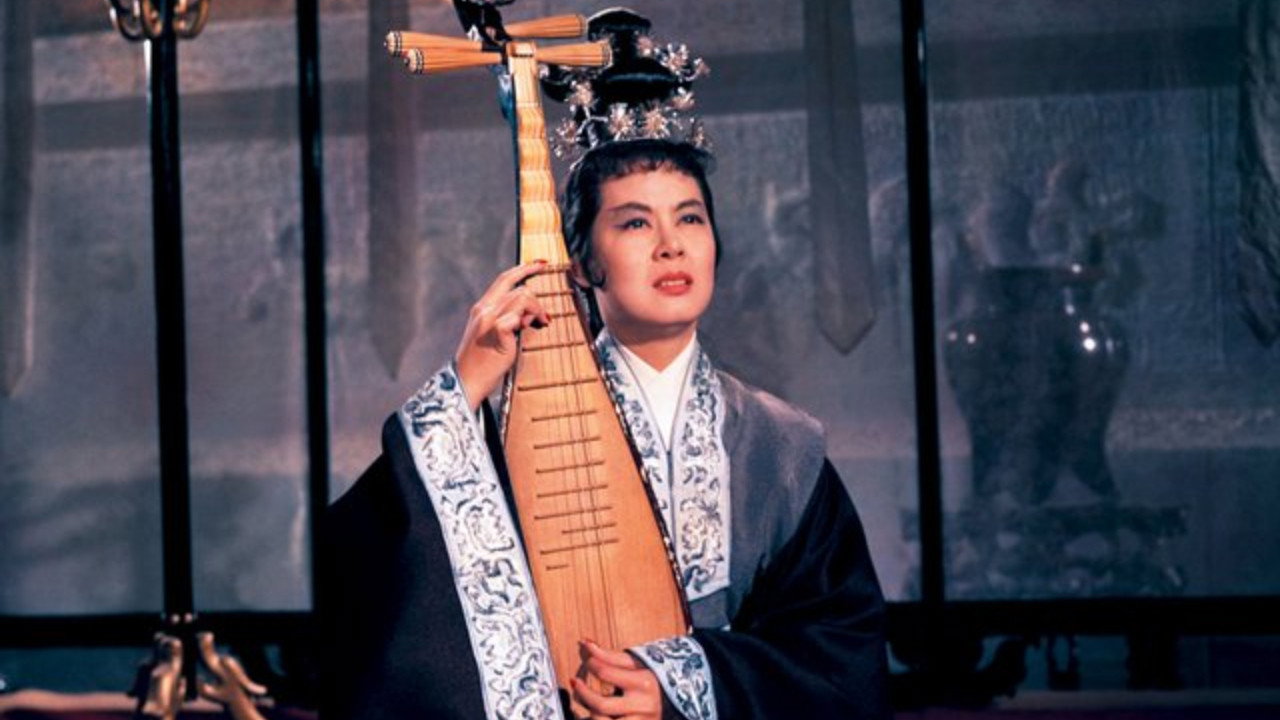 Linda Lin Dai plays a stringed Chinese instrument
